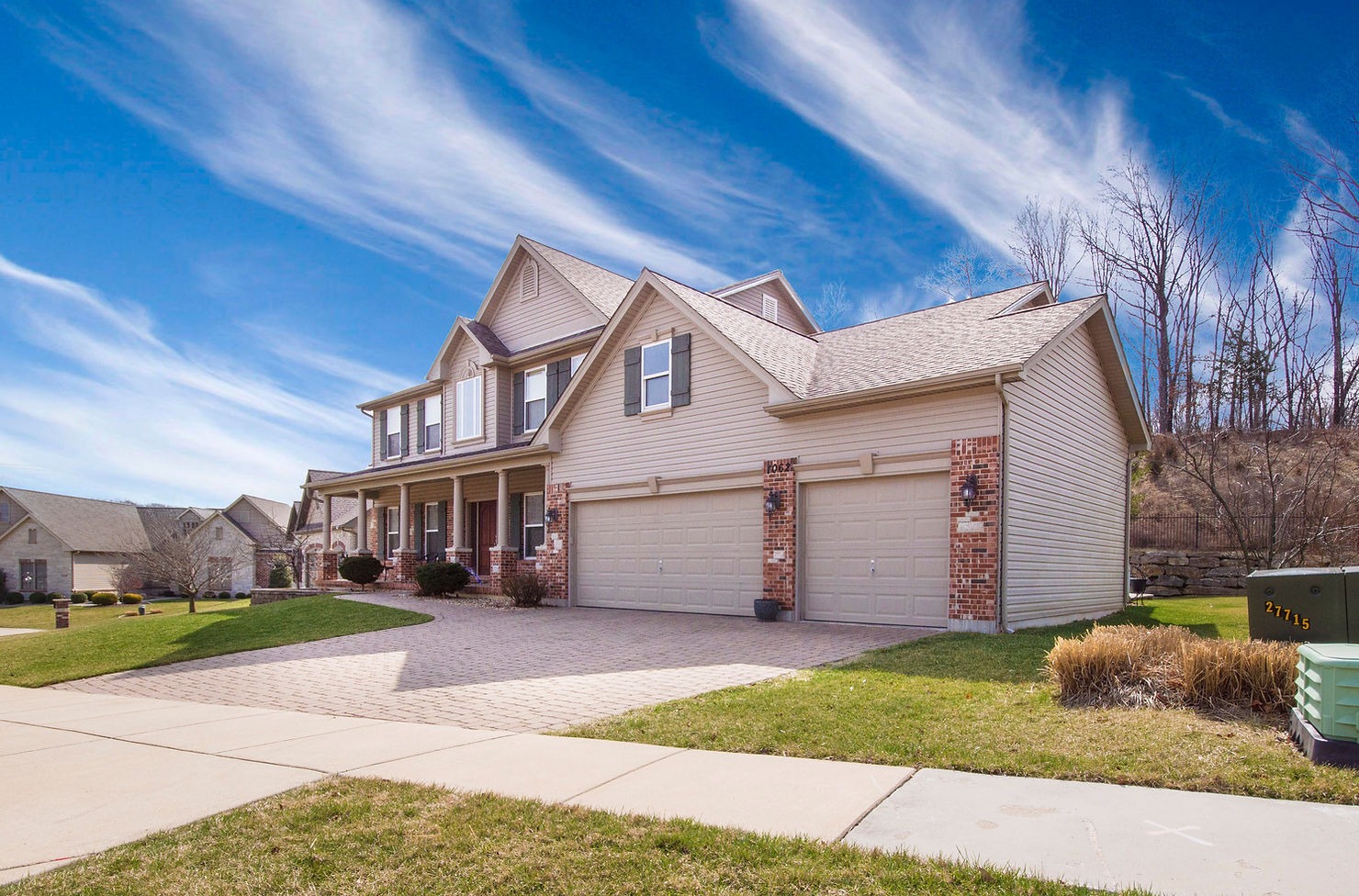 A home with a garage and driveway.